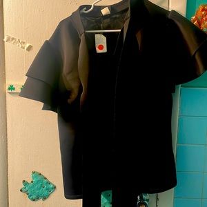 Black blouse with ruffle sleeves with belt that ties